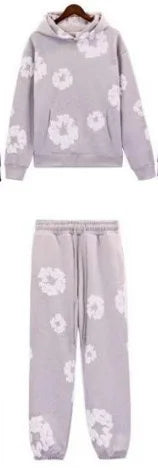 Marca DENIM TEARS, superventas, nueva sudadera con capucha estampada de espuma de algodón a la moda, traje deportivo de moda europea y americana para hombres