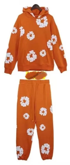 Marca DENIM TEARS, superventas, nueva sudadera con capucha estampada de espuma de algodón a la moda, traje deportivo de moda europea y americana para hombres